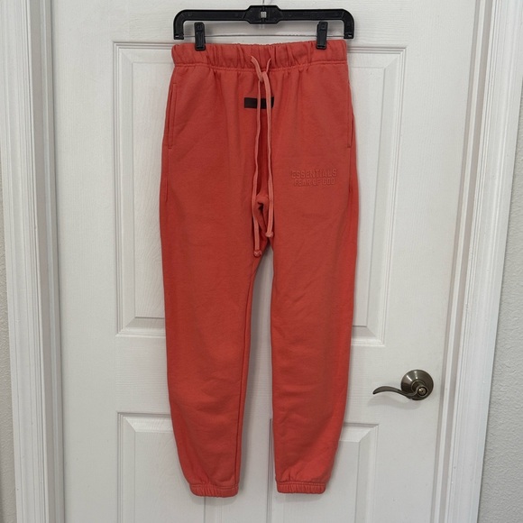 Fear of God Essentials men’s coral Sweatpants - Picture 1 of 8